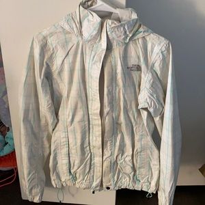 White tan and turquoise north face